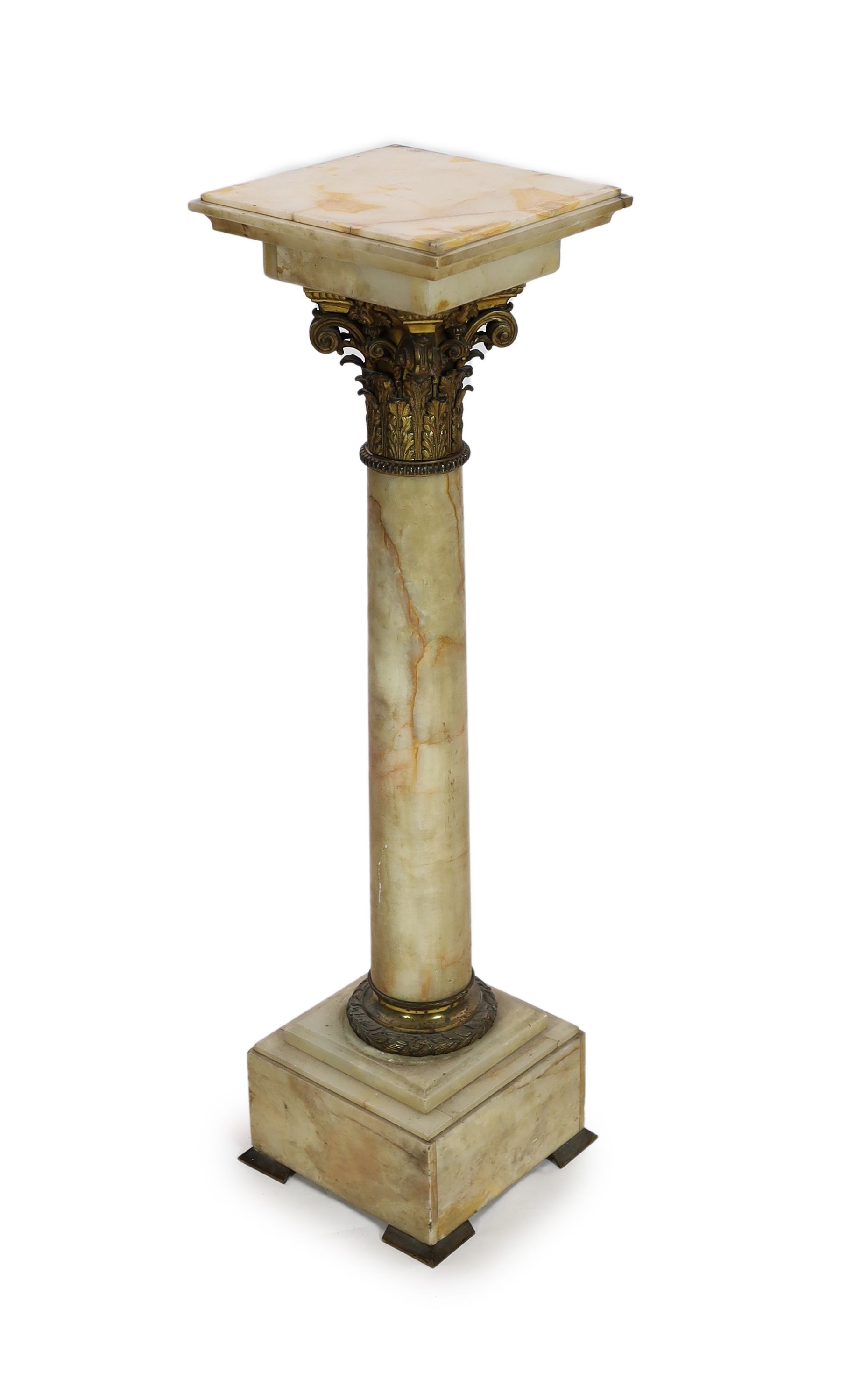 An Edwardian ormolu mounted onyx pedestal, W,32cm H.117cm